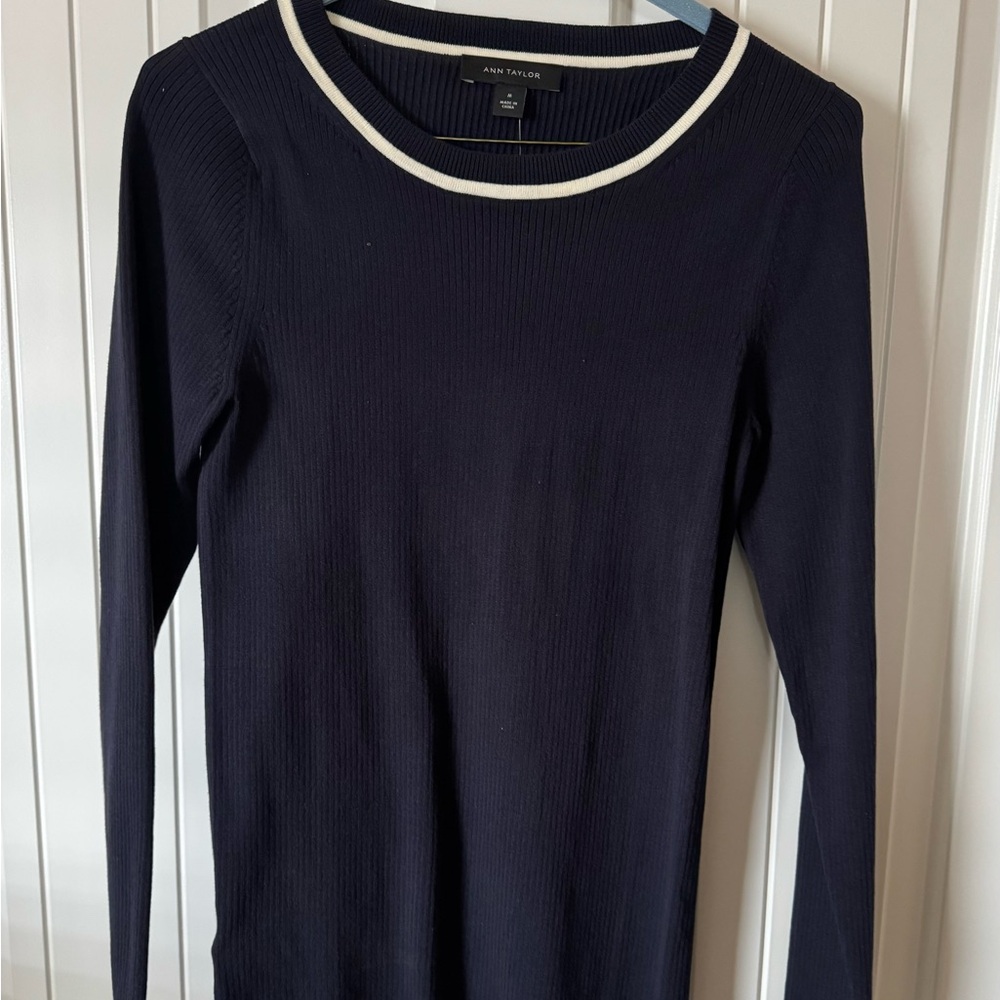 Navy sweater with white trim
